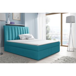 Luxurious and comfortable Rene continental bed with a storage compartment for bedding.