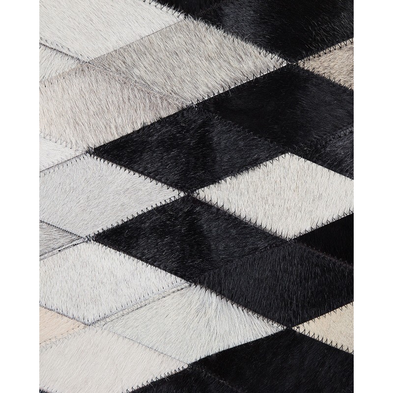 Dywan patchwork skórzany 140 x 200 cm czarno-biały MALDAN Dywan patchwork skórzany 140 x 200 cm czarno-biały MALDAN
