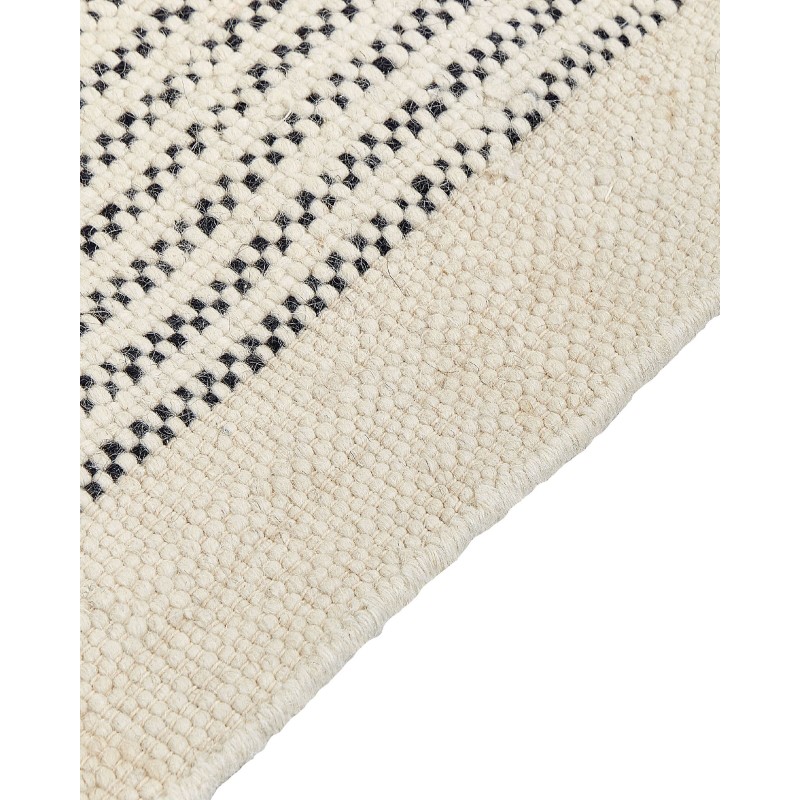 Dywan wełniany 80 x 150 cm beżowo-czarny DIVARLI Dywan wełniany 80 x 150 cm beżowo-czarny DIVARLI