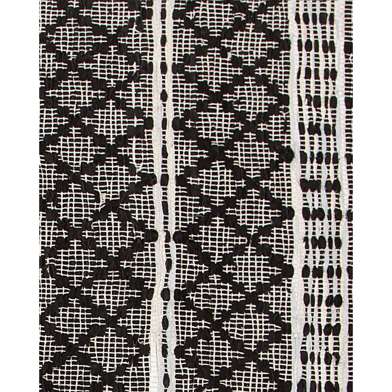 Dywan skórzany 140 x 200 cm czarny z beżowym FEHIMLI Dywan skórzany 140 x 200 cm czarny z beżowym FEHIMLI