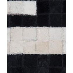 Dywan skórzany 80 x 150 cm czarno-biały BOLU Dywan skórzany 80 x 150 cm czarno-biały BOLU