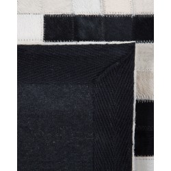 Dywan skórzany 80 x 150 cm czarno-biały BOLU Dywan skórzany 80 x 150 cm czarno-biały BOLU